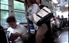 Pretty Japanese lady fingered on bus