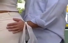 Touching her ass...